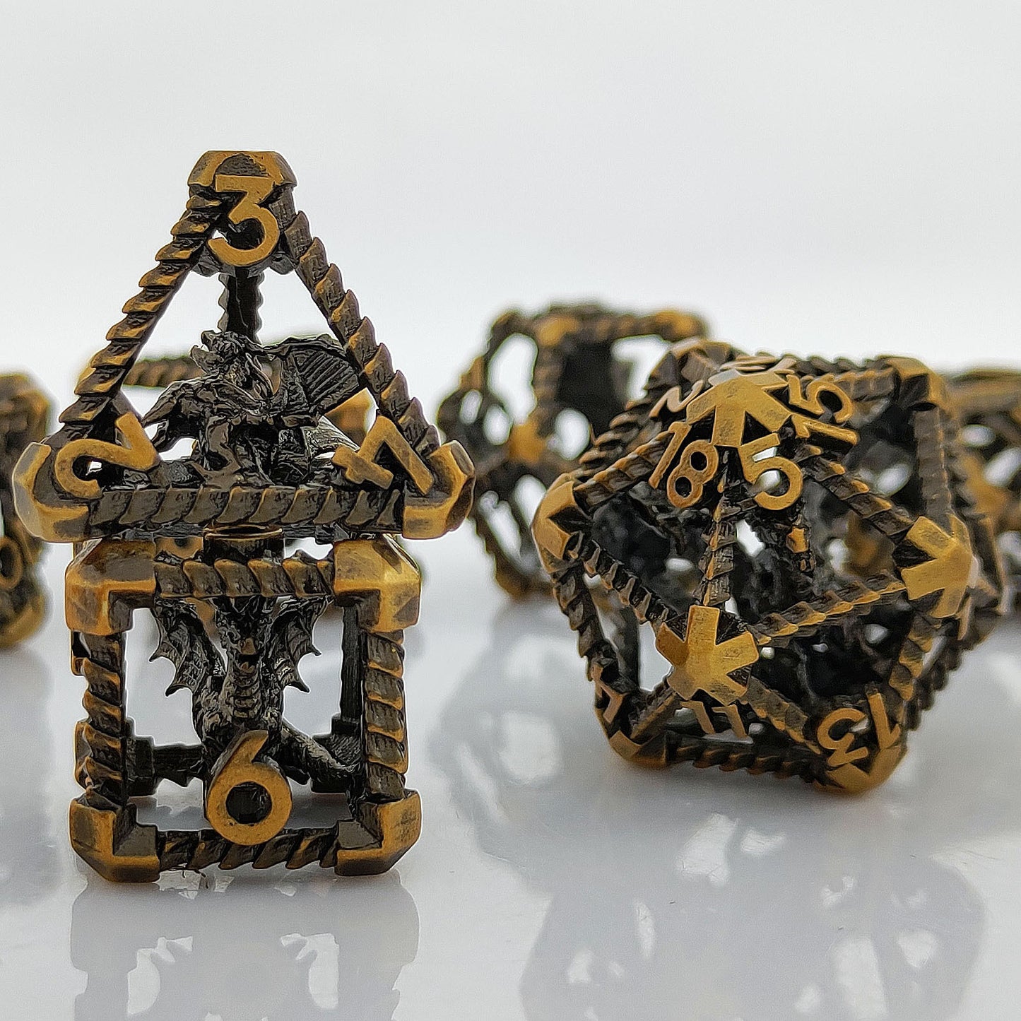 Caged Dragon Metal Dice Set – Brass Highlights