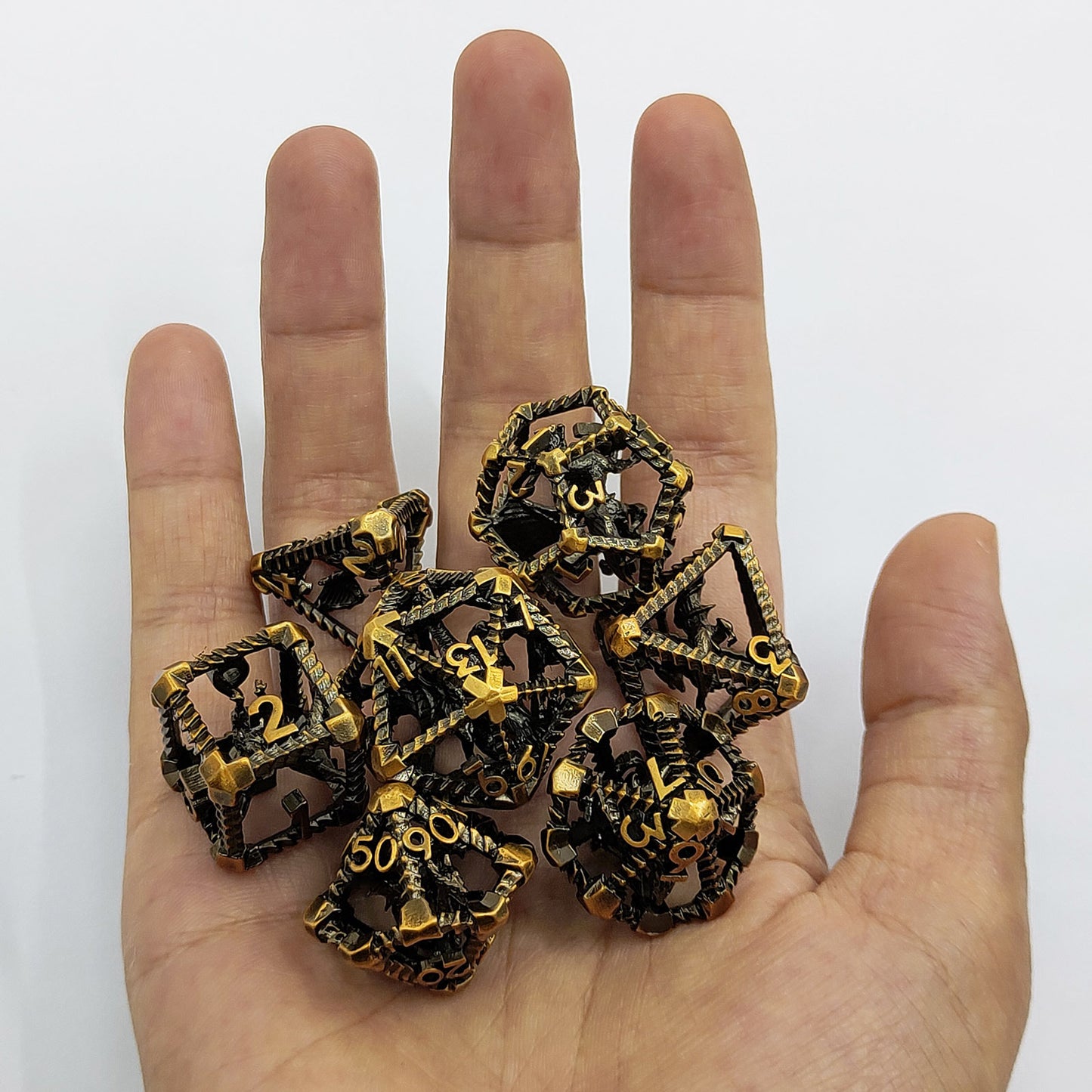 Caged Dragon Metal Dice Set – Brass Highlights
