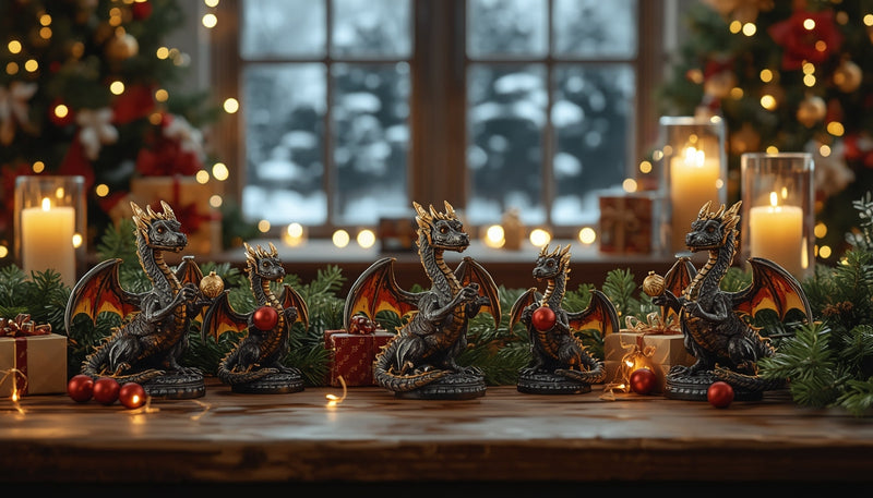 Festive dragon figurines arranged with Christmas decorations, pine garland, candles and gift boxes in a warm holiday setting.