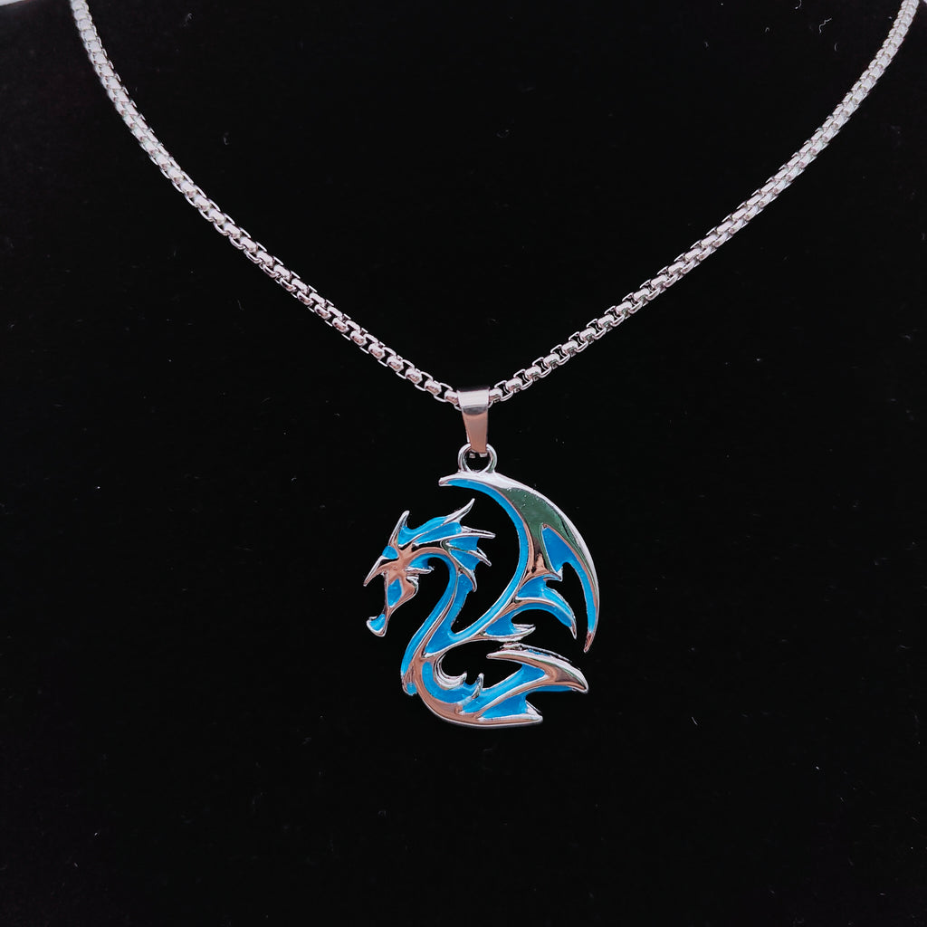 Blue tribal dragon pendant necklace with detailed silver-tone wings