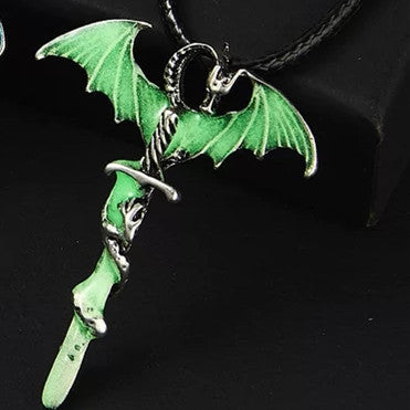 Green luminous dragon sword pendant with detailed wings