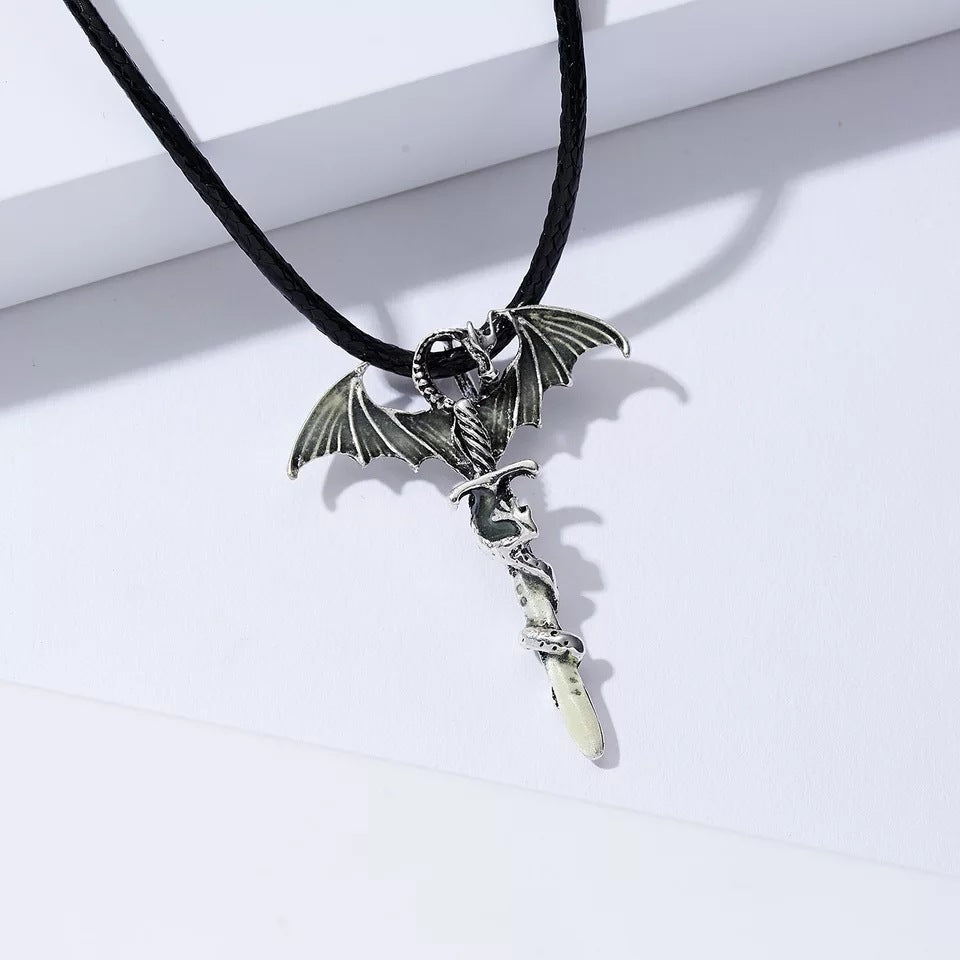 Silver-tone dragon sword pendant with black cord necklace
