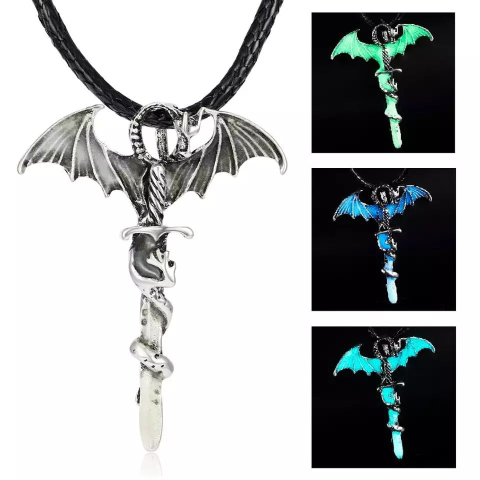 Dragon sword pendant showing silver-tone finish and three luminous colours