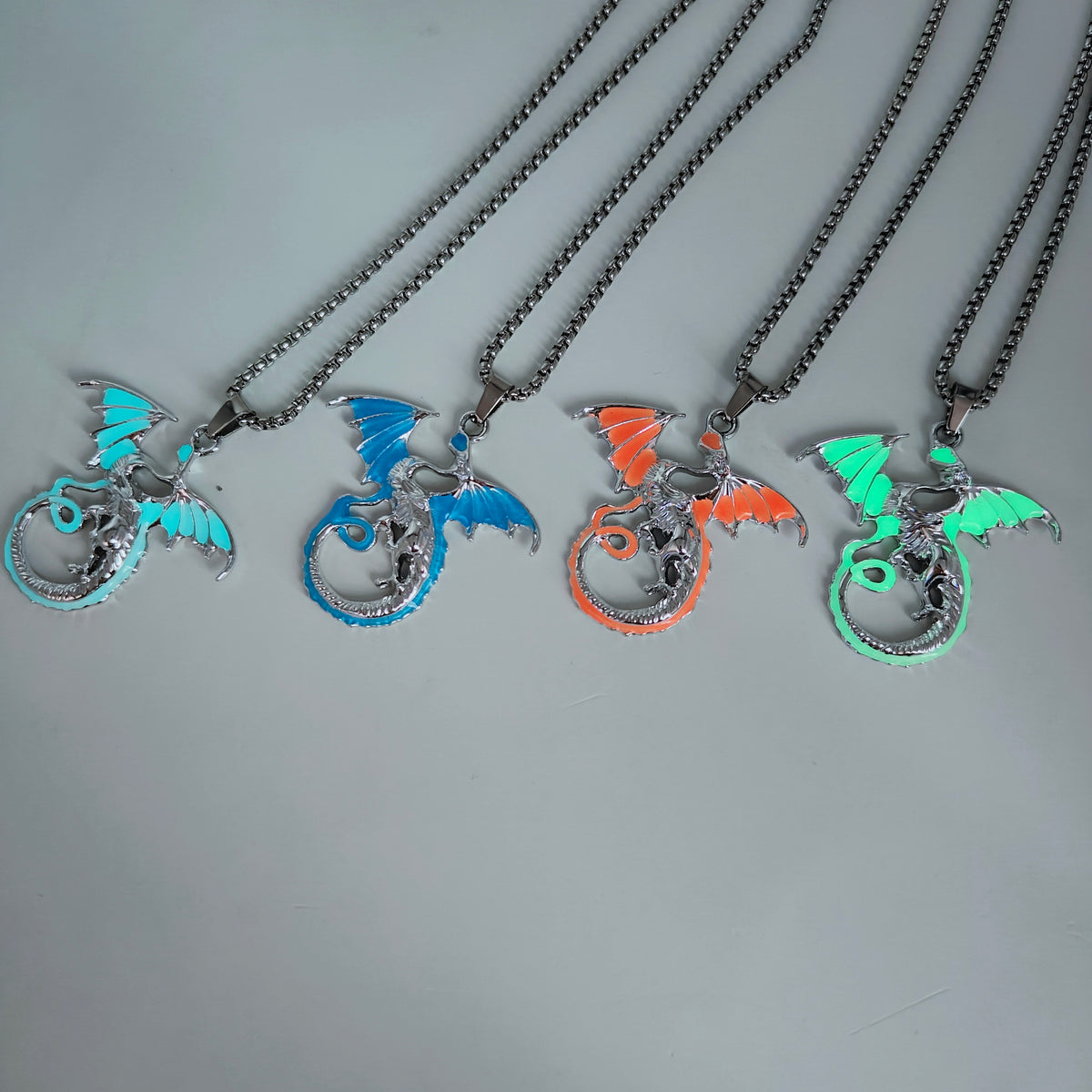 Glow in the dark flying dragon alloy necklaces in four colours