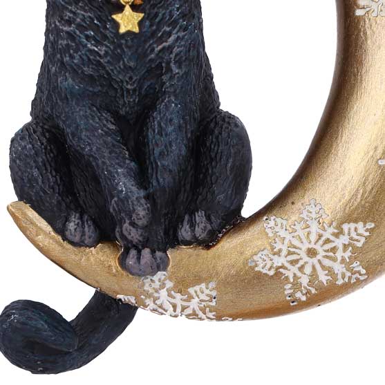 Hand-painted golden crescent moon and white snowflake details on Lisa Parker Moon Cat ornament