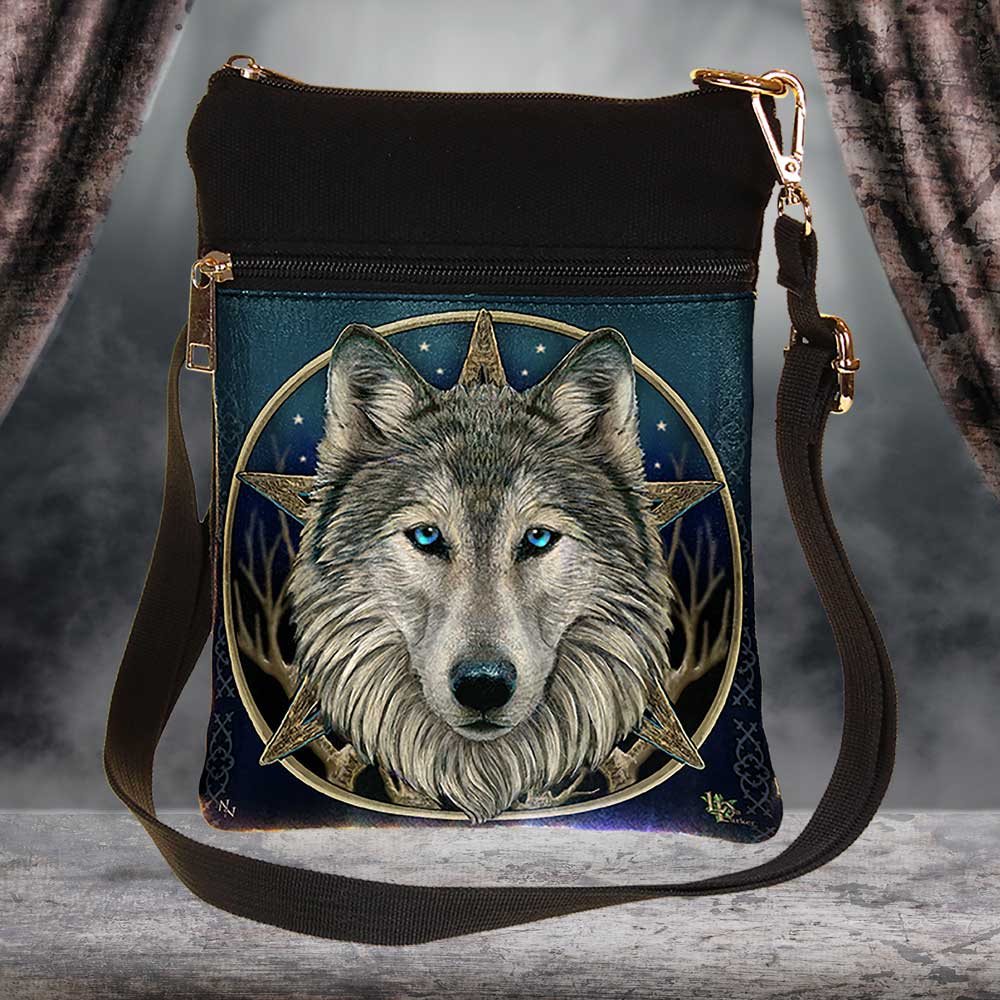 Lisa Parker Wild One wolf shoulder bag displayed in a dark fantasy setting