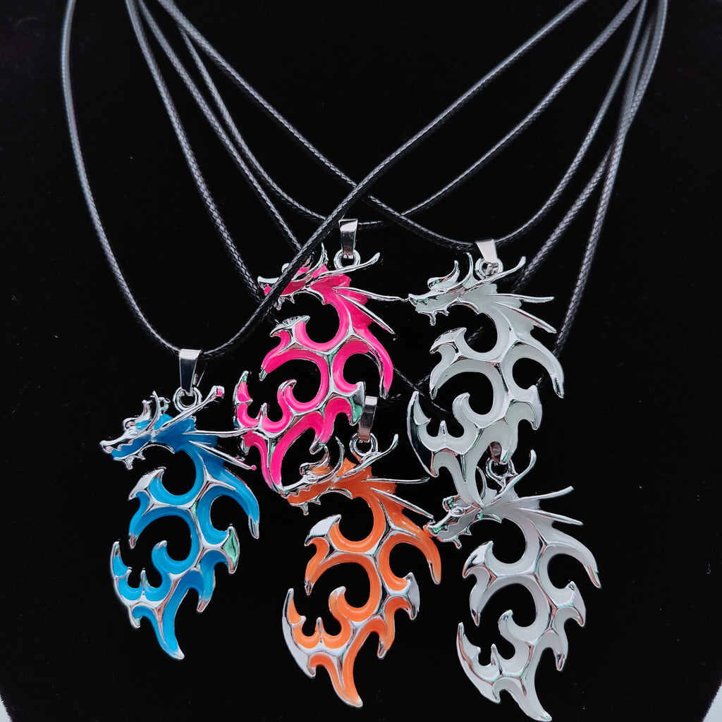 Tribal Flame glow in the dark dragon pendant necklaces in assorted colours with black cords